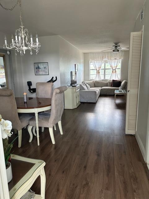 Undisclosed Address Lauderhill, FL 33313 - Photo 5 of 25 a living room with furniture and a chandelier