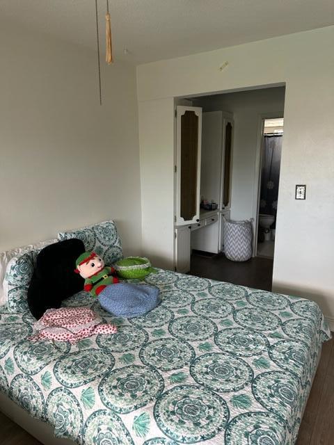 Undisclosed Address Lauderhill, FL 33313 - Photo 10 of 25 a bedroom with a bed and a couch