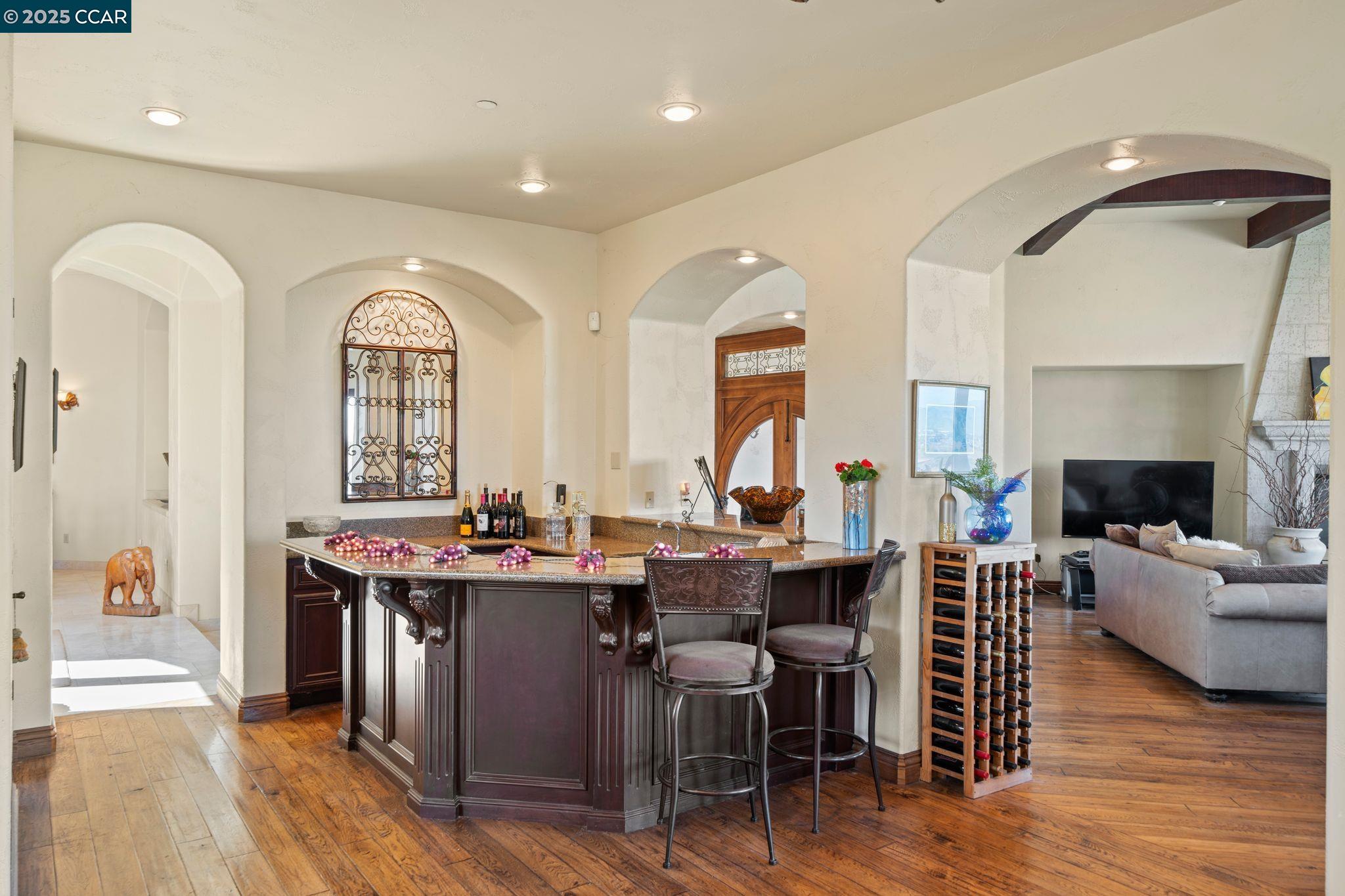 633 Kalthoff Common Livermore, CA 94550 - Photo 11 of 60 a view of a dining room with furniture and wooden floor