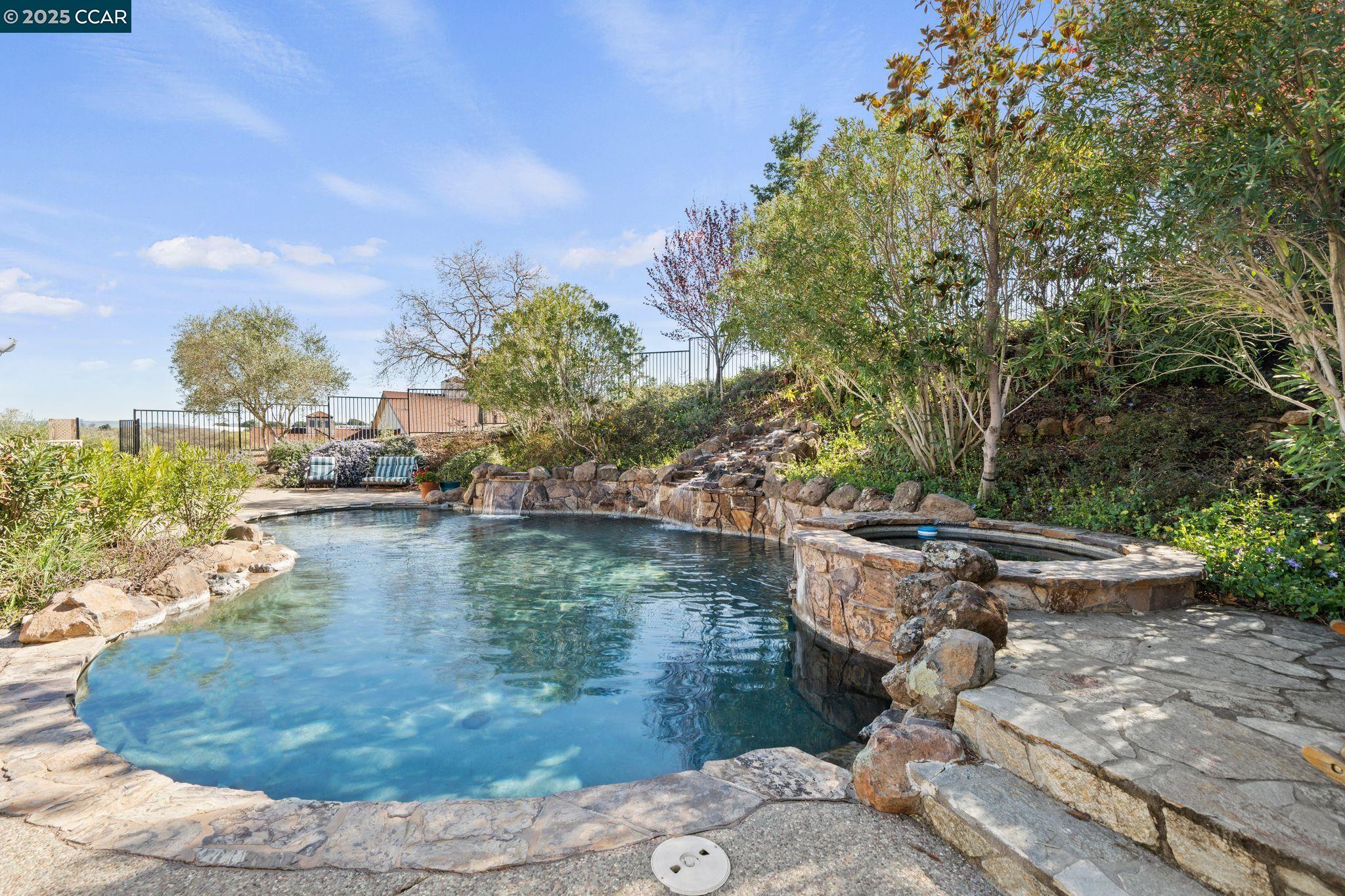 633 Kalthoff Common Livermore, CA 94550 - Photo 27 of 60 a view of a water fountain in the backyard