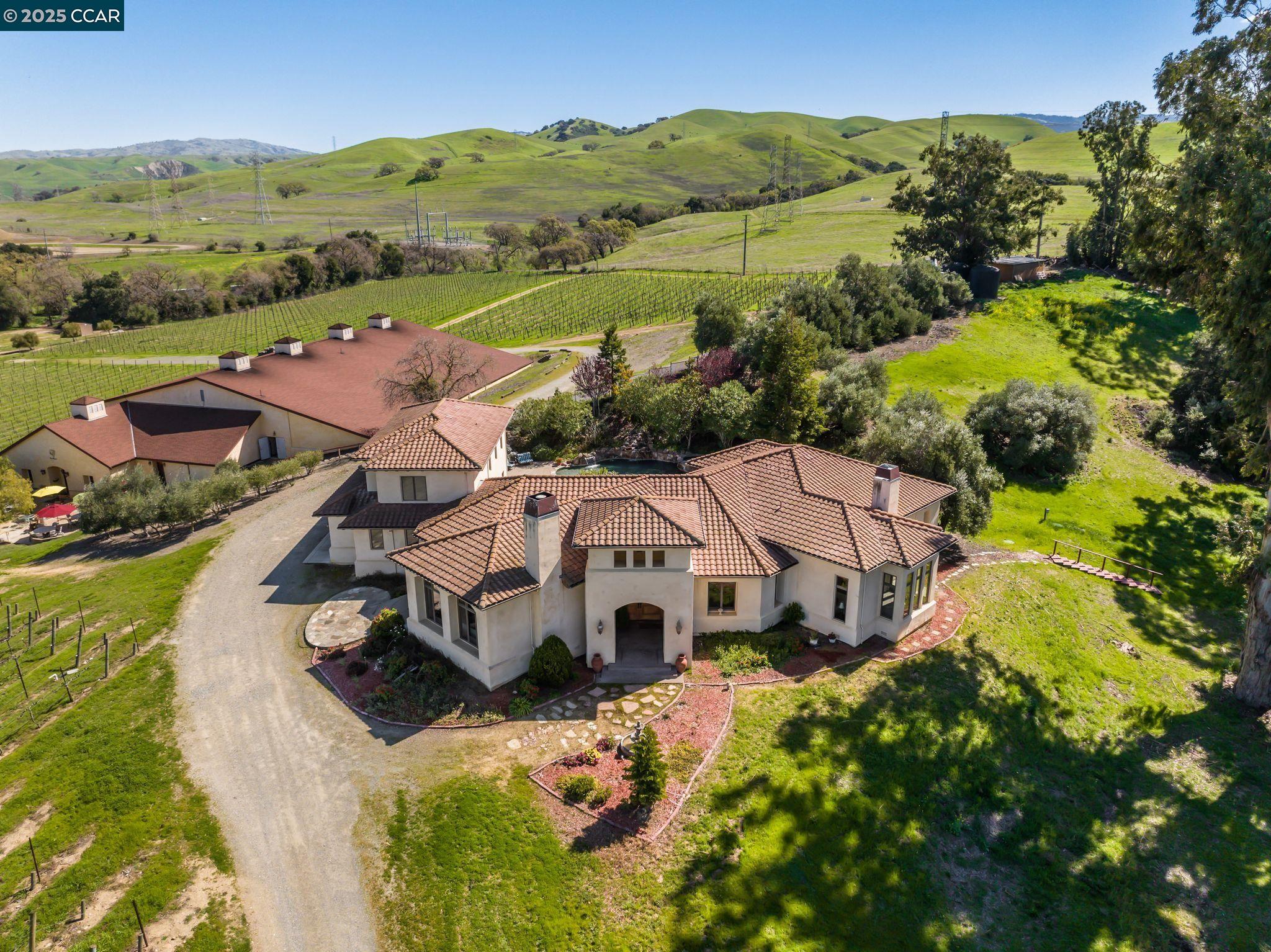 633 Kalthoff Common Livermore, CA 94550 - Photo 33 of 60 an aerial view of a house with a mountain