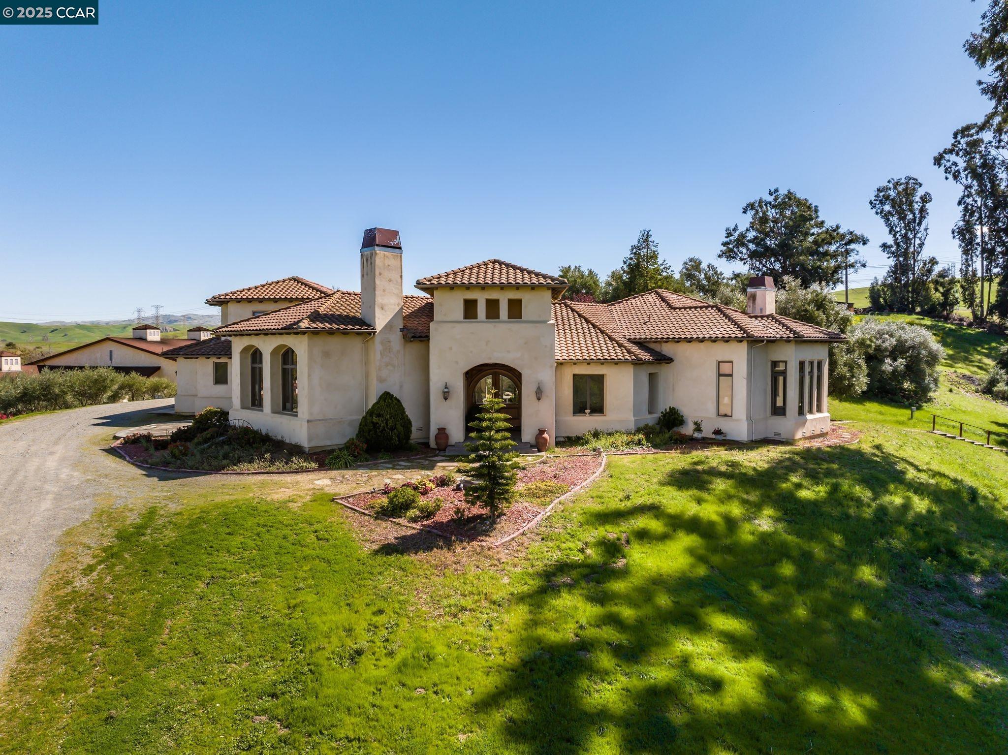 633 Kalthoff Common Livermore, CA 94550 - Photo 34 of 60 a view of a house with wooden fence