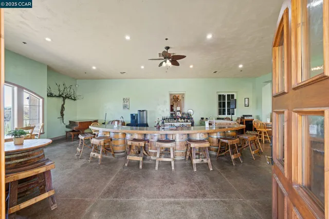 a outdoor space with lots of furniture and clutter