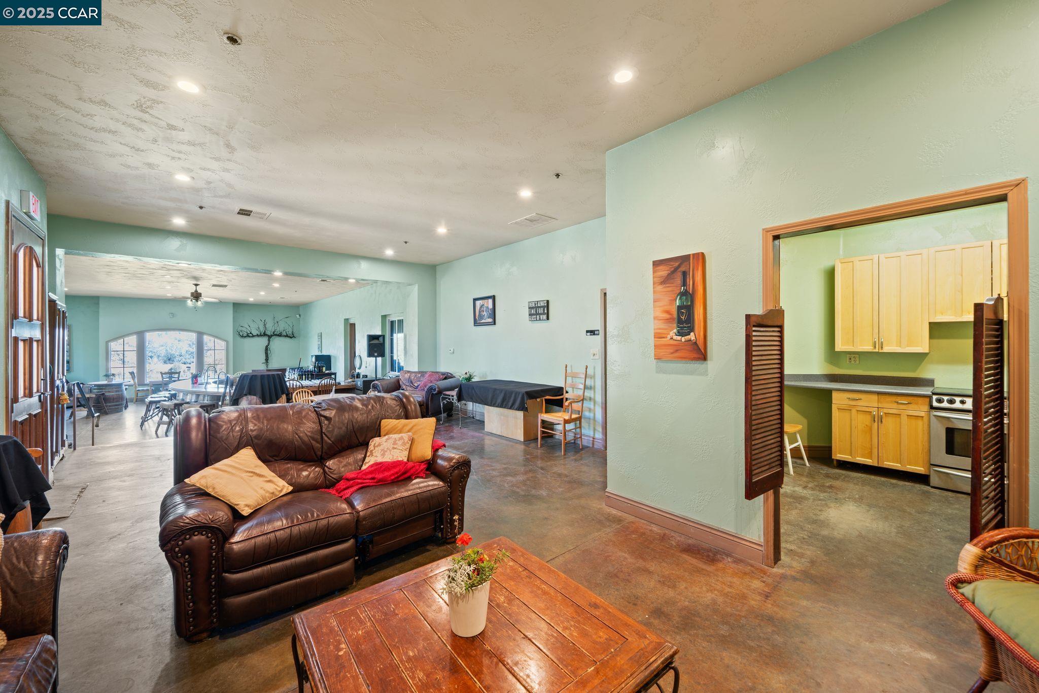633 Kalthoff Common Livermore, CA 94550 - Photo 44 of 60 a living room with furniture and a flat screen tv