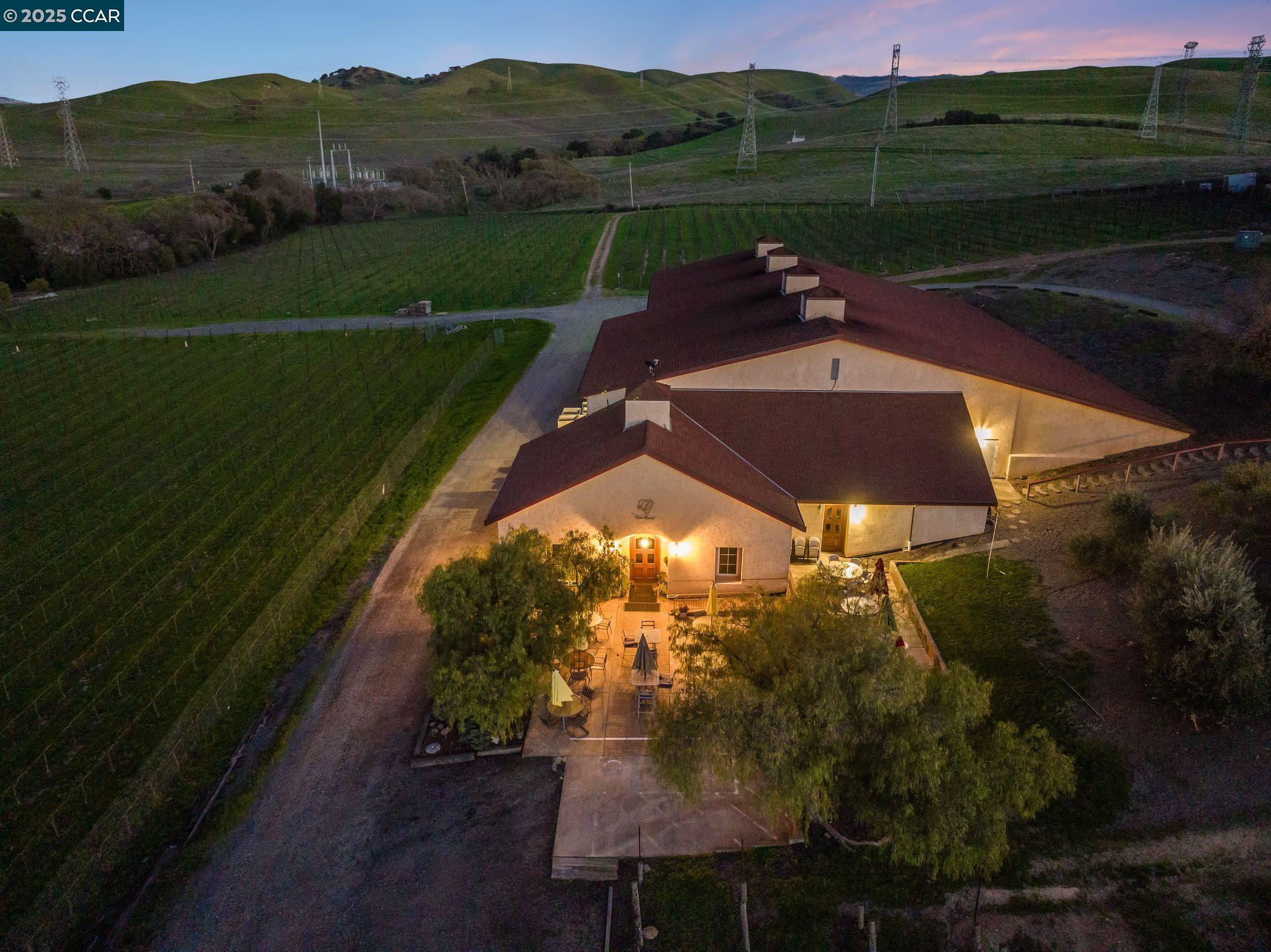 633 Kalthoff Common Livermore, CA 94550 - Photo 59 of 60 a view of a lake in front of a house with a yard