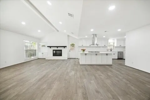 a view of a kitchen with a stove top oven