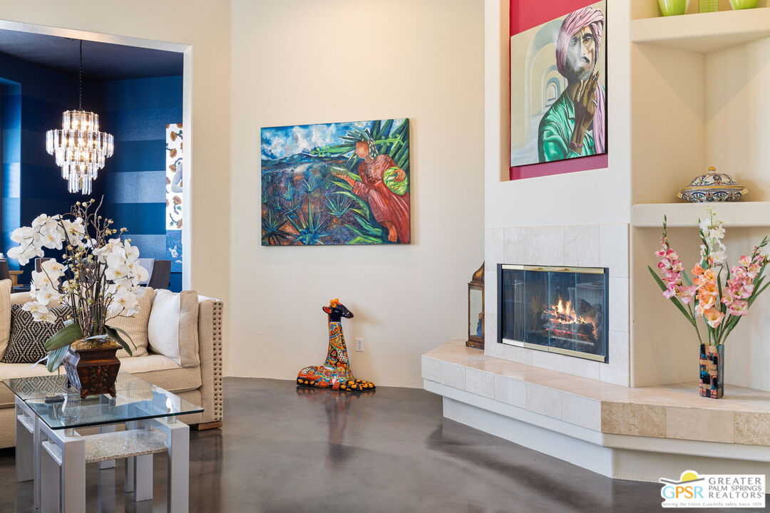 36630 Palm Court Rancho Mirage, CA 92270 - Photo 13 of 46 a living room with furniture and a fireplace