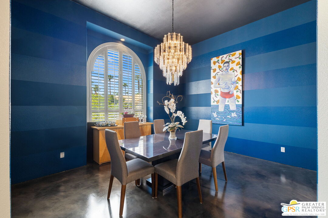 36630 Palm Court Rancho Mirage, CA 92270 - Photo 15 of 46 a view of a dining room with furniture window and wooden floor