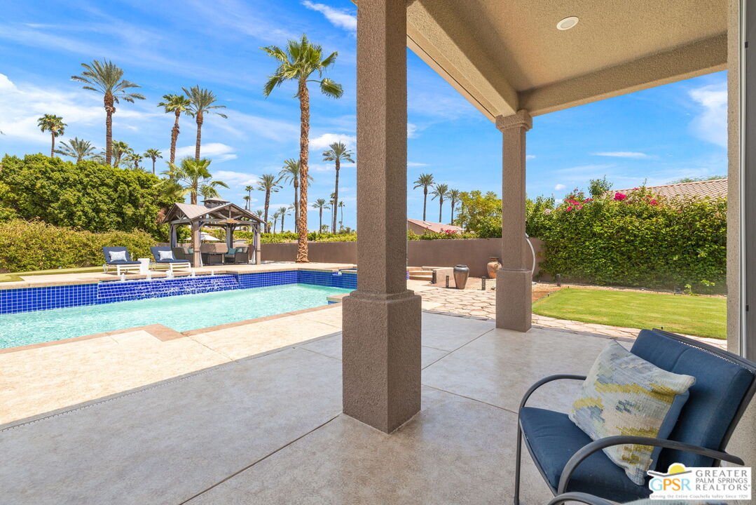 36630 Palm Court Rancho Mirage, CA 92270 - Photo 20 of 46 a view of a porch with furniture and a yard