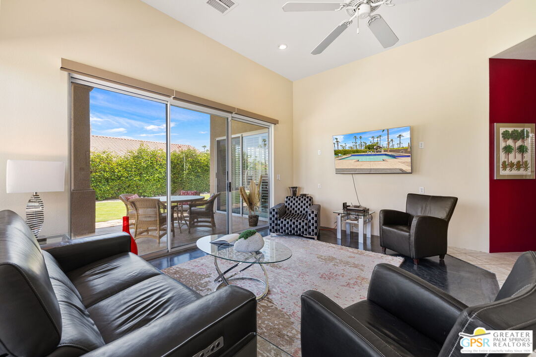 36630 Palm Court Rancho Mirage, CA 92270 - Photo 28 of 46 a living room with furniture and a large window