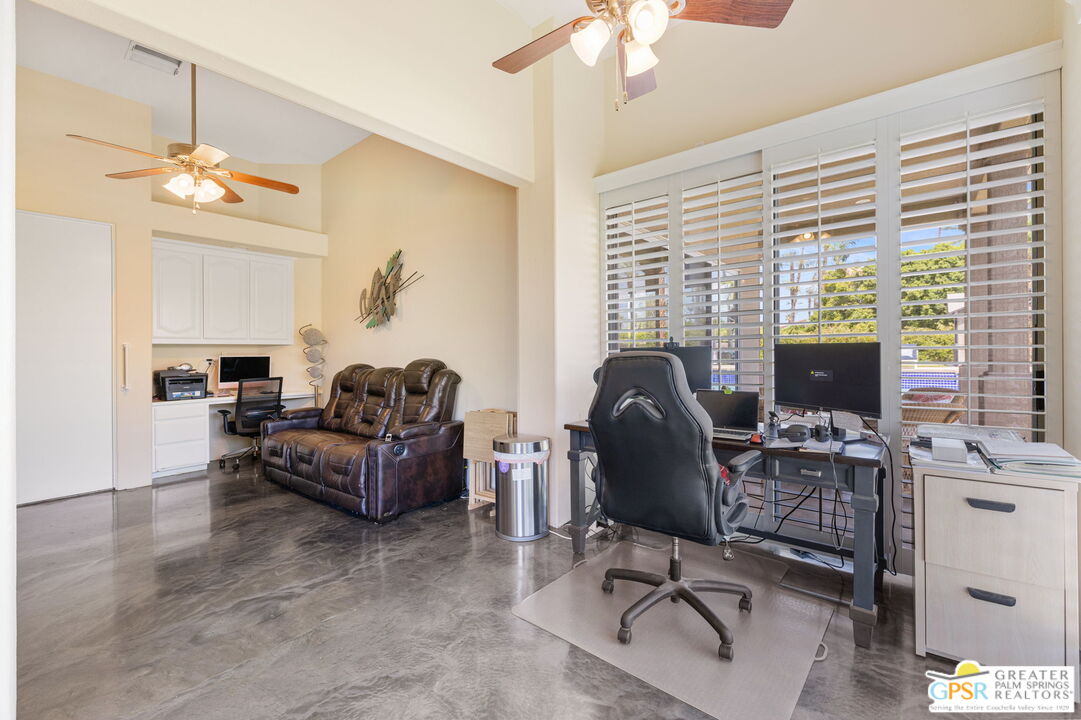 36630 Palm Court Rancho Mirage, CA 92270 - Photo 31 of 46 a view of a workspace with furniture and a window