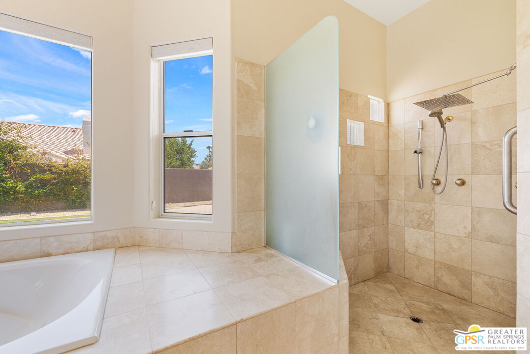 36630 Palm Court Rancho Mirage, CA 92270 - Photo 35 of 46 a bathroom with a bathtub and shower