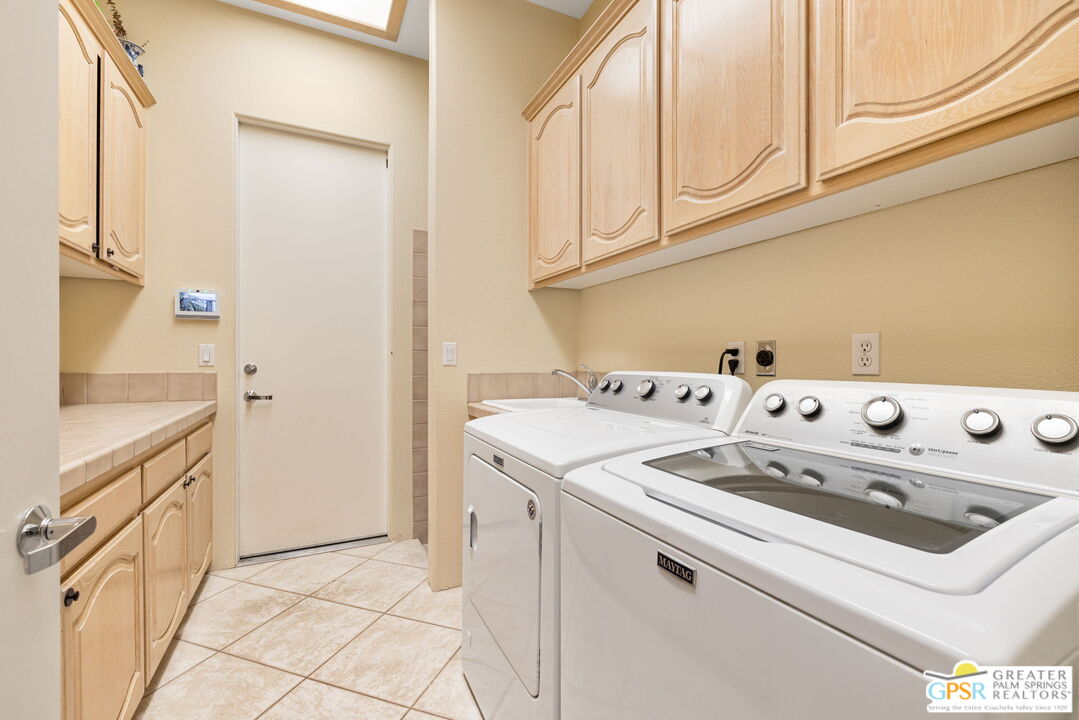 36630 Palm Court Rancho Mirage, CA 92270 - Photo 45 of 46 a utility room with dryer and washer