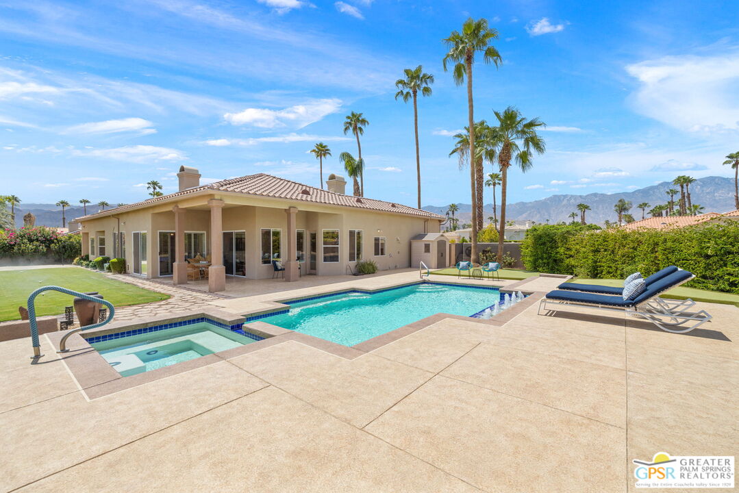 36630 Palm Court Rancho Mirage, CA 92270 - Photo 5 of 46 a view of a house with swimming pool and sitting area
