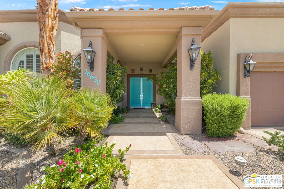 36630 Palm Court Rancho Mirage, CA 92270 - Photo 9 of 46 a entryway view with a potted plant