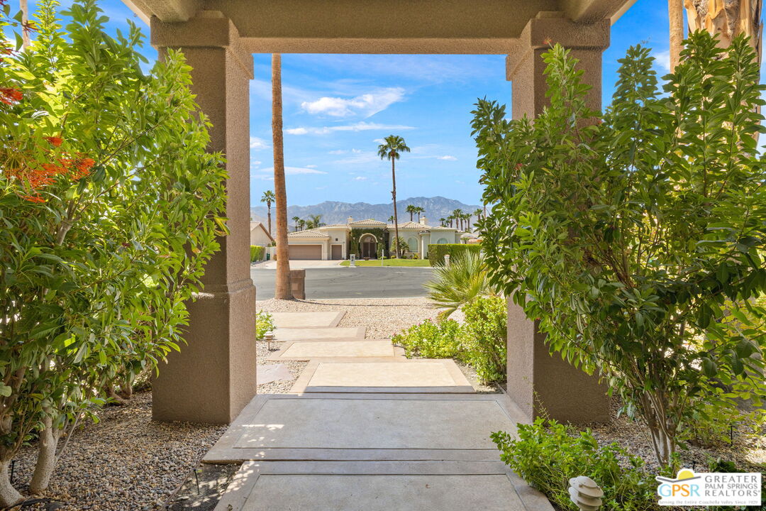 36630 Palm Court Rancho Mirage, CA 92270 - Photo 10 of 46 a view of a porch with a tree