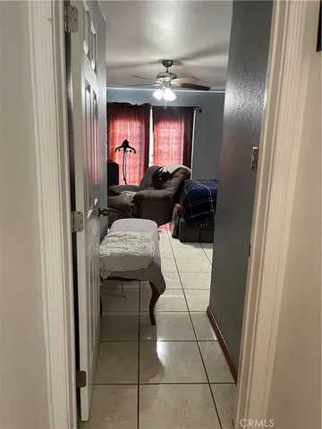 a bathroom with a toilet a sink and a mirror