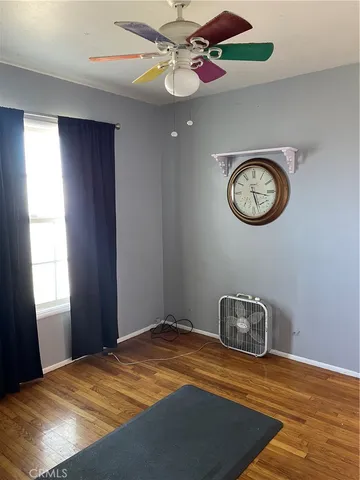 a outdoor space with patio couch and a glass door