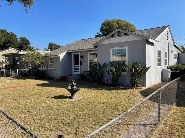 a view of street with parked cars
