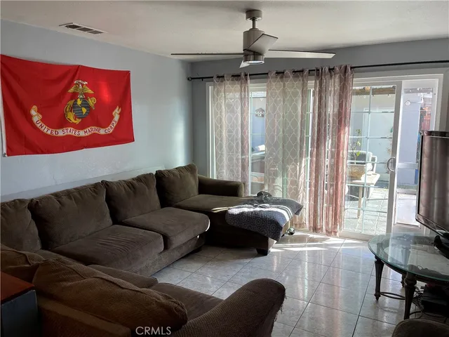 a view of a glass door and a porch