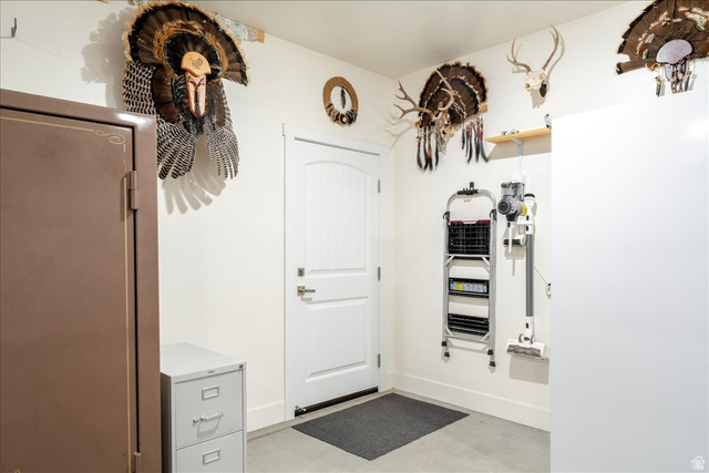 357 East Main Street Enterprise, UT 84725 - Photo 43 of 71 Foyer entrance with baseboards and concrete flooring