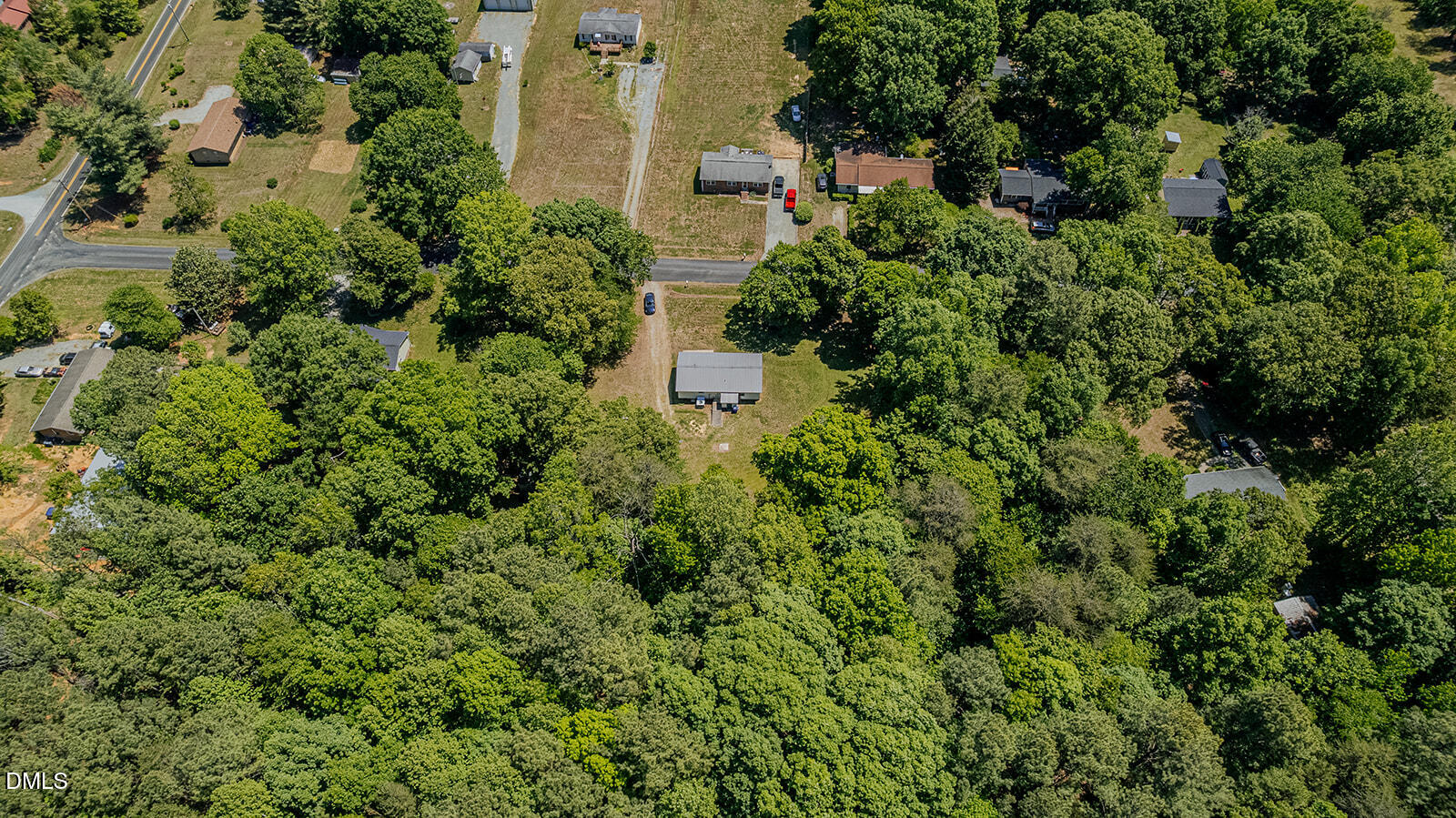 1302 Blacksmith Road Efland, NC 27243 - Photo 40 of 46 an aerial view of a house with a yard
