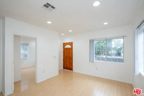 an empty room with windows