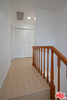 a bathroom with a sink a toilet and bathtub
