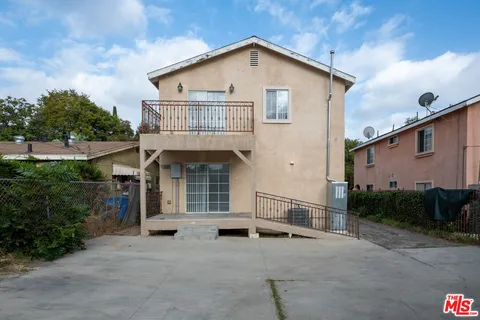 a view of a house with a patio
