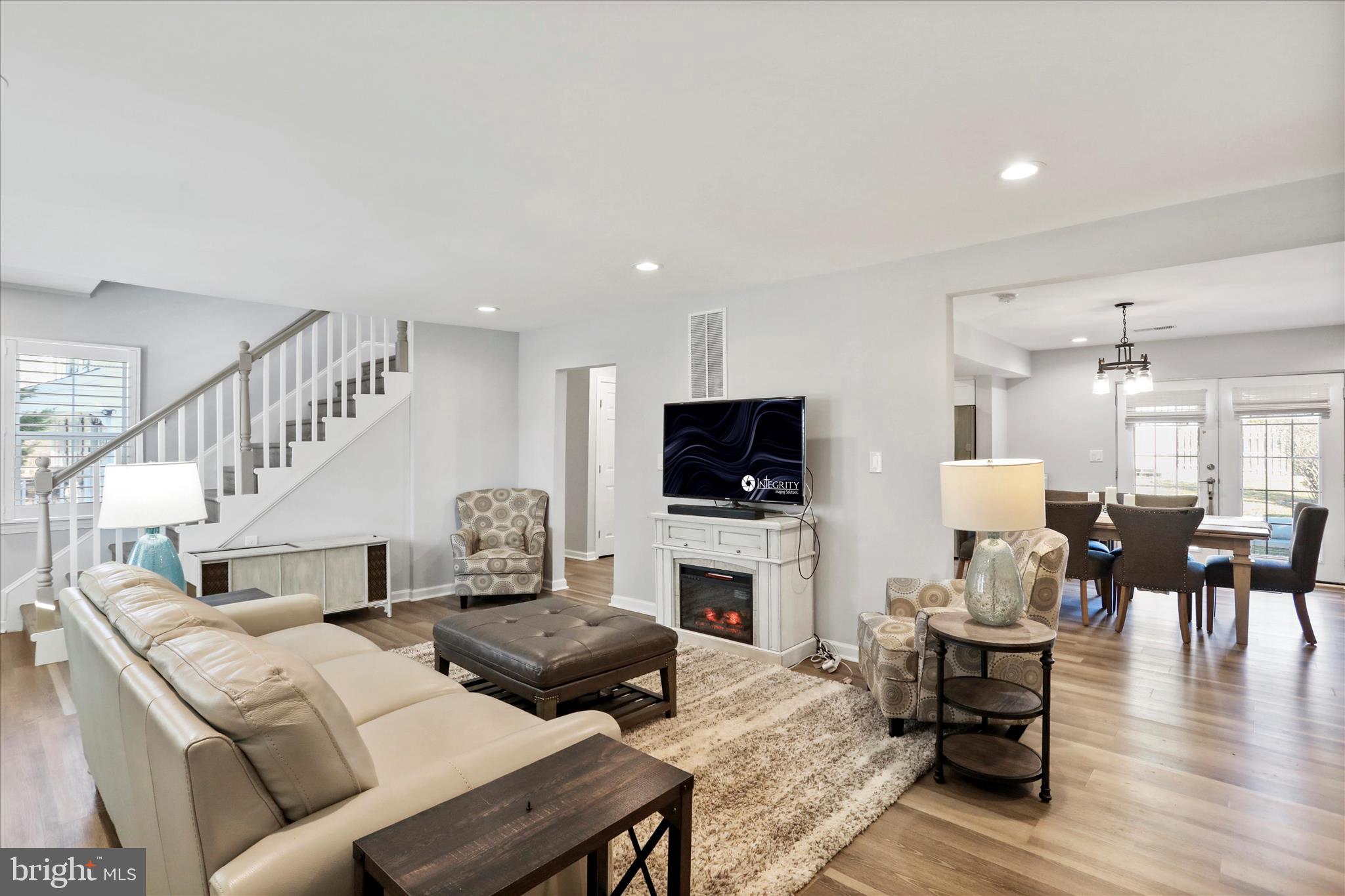 408 Blue Ridge Avenue Northeast Leesburg, VA 20176 - Photo 15 of 36 a living room with furniture fireplace and a flat screen tv