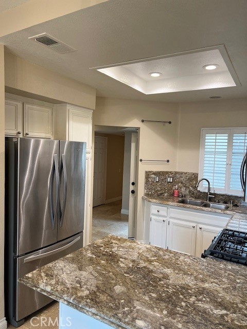 31 Chandon Laguna Niguel, CA 92677 - Photo 2 of 13 a kitchen with granite countertop a refrigerator and a sink