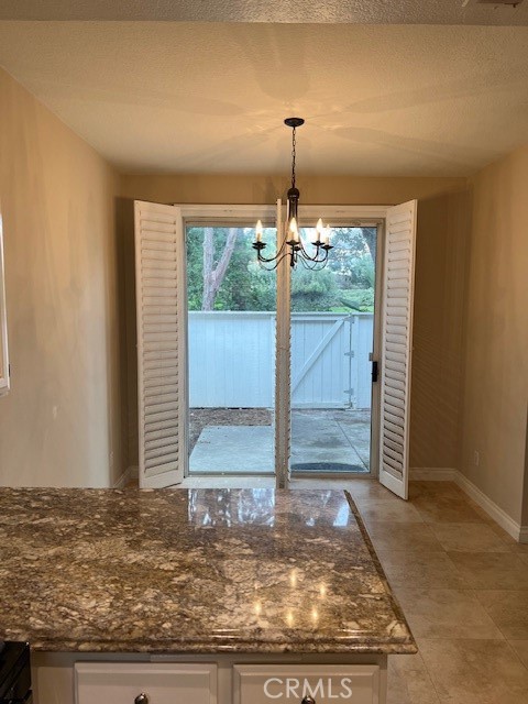 31 Chandon Laguna Niguel, CA 92677 - Photo 4 of 13 a view of a hall with a door