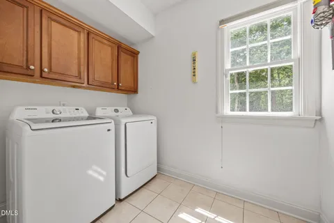 a spacious bathroom with sink shower and bathtub