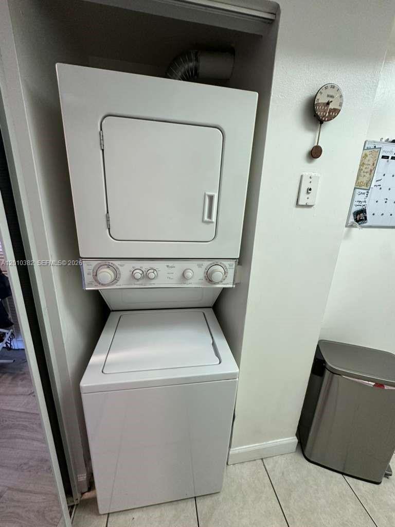 8261 Northwest 8th Street, Unit 423 Miami, FL 33126 - Photo 11 of 11 a utility room with dryer and washer