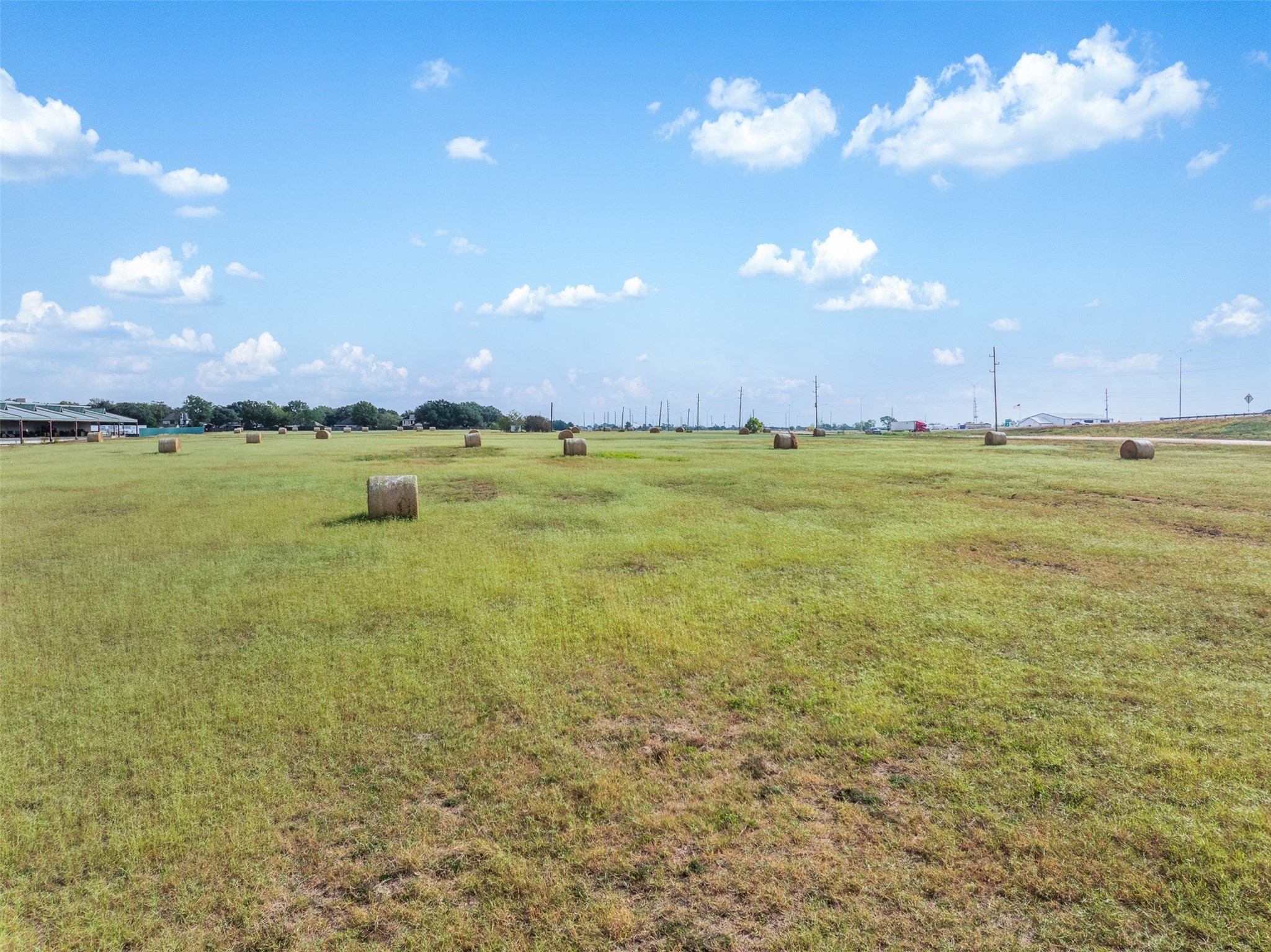 233 Kersten Road Sealy, TX 77474 - Photo 20 of 22 a view of an ocean and a yard