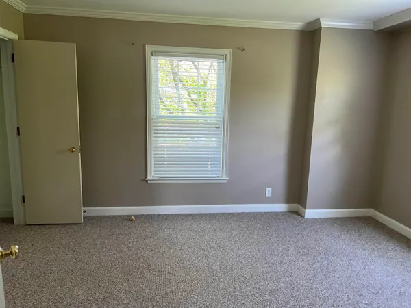 a view of a room with rack on the wall