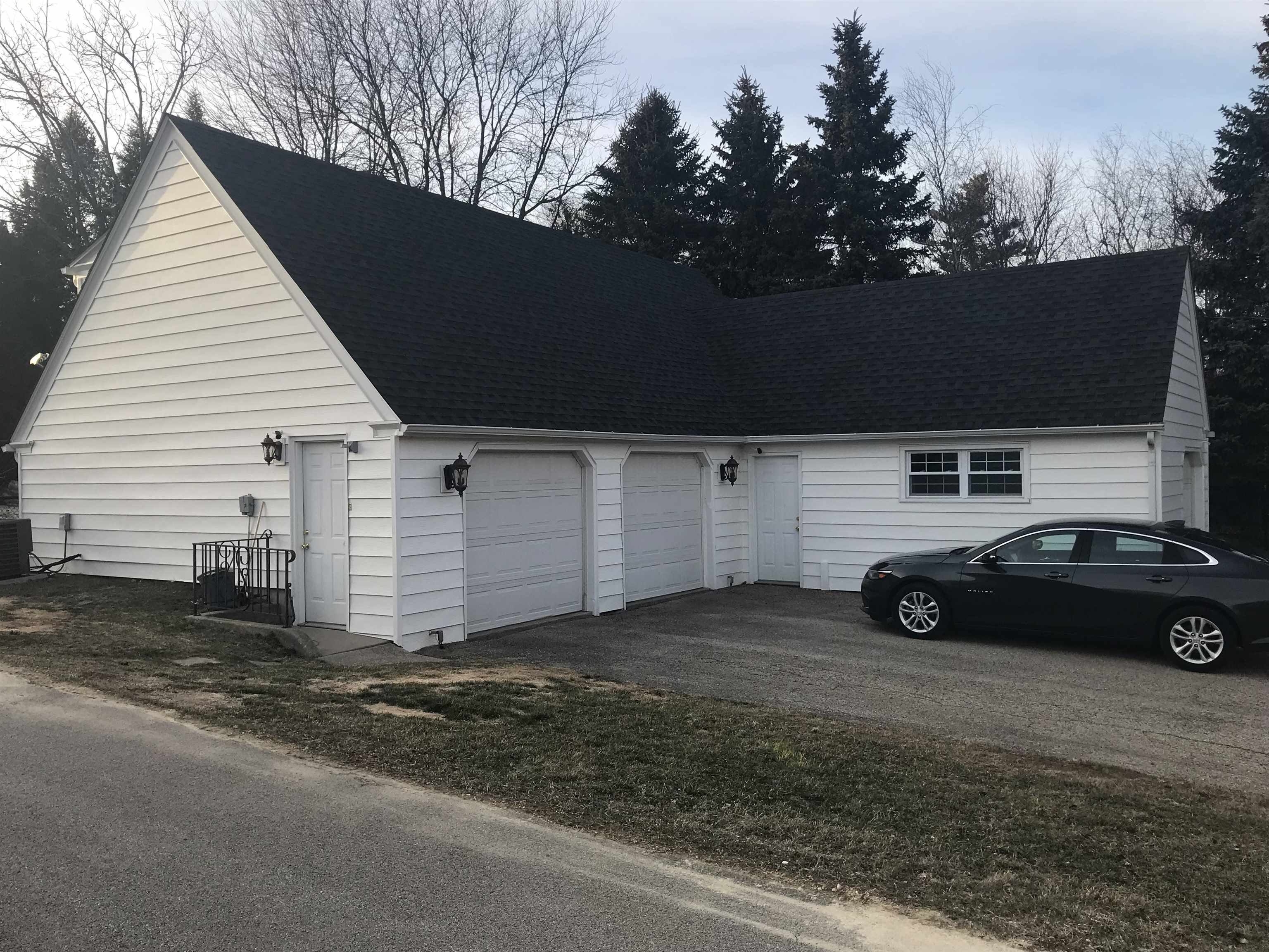 5382 Guilford Road Rockford, IL 61107 - Photo 20 of 66 a car parked in front of a house