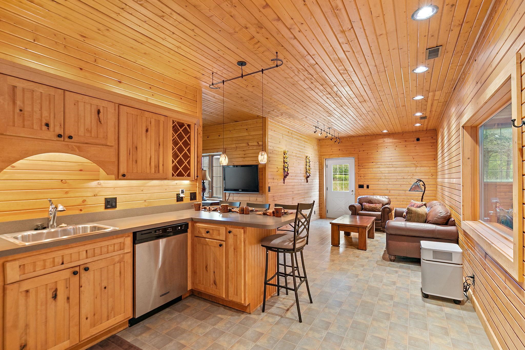 5382 Guilford Road Rockford, IL 61107 - Photo 39 of 72 a kitchen with lots of counter top space and living room