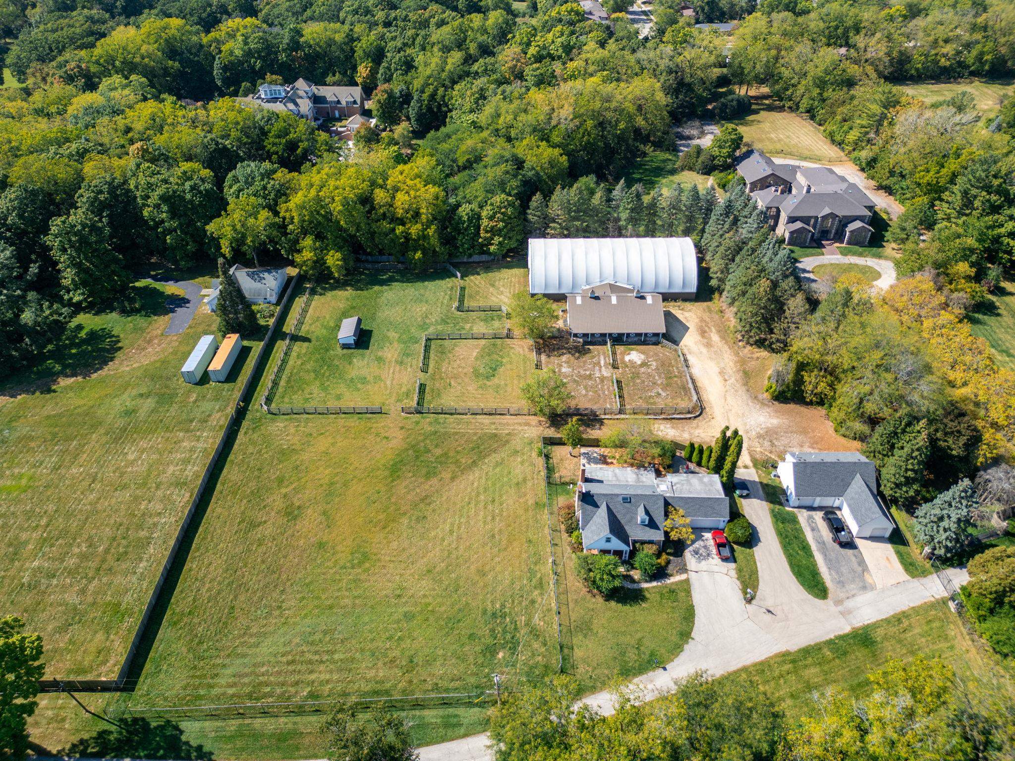 5382 Guilford Road Rockford, IL 61107 - Photo 39 of 66 an aerial view of residential houses with outdoor space