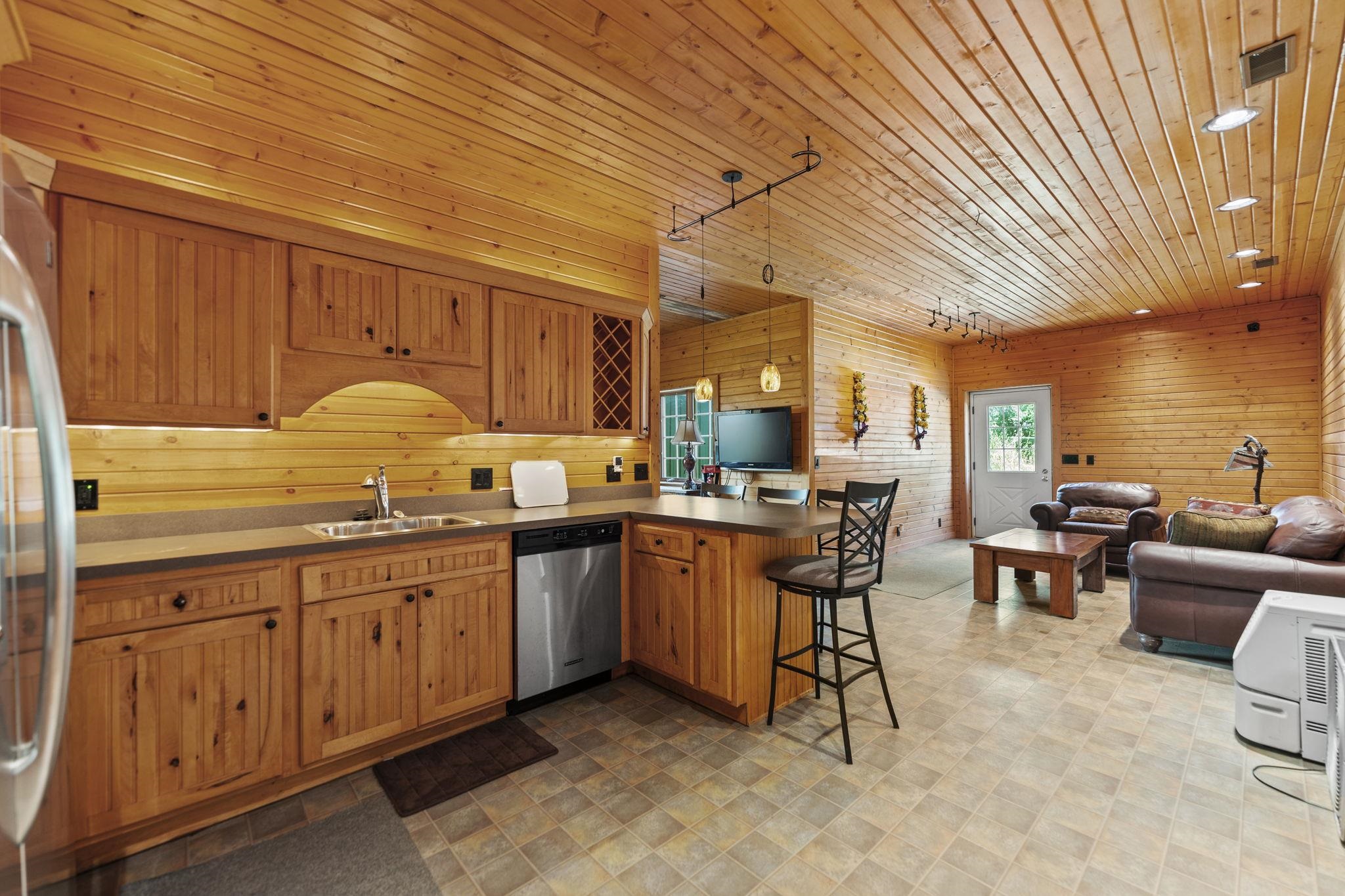 5382 Guilford Road Rockford, IL 61107 - Photo 51 of 66 a kitchen with lots of counter top space and dining table