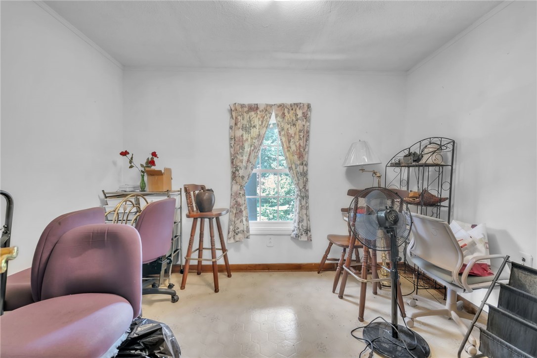 602 Harper Road Pendleton, SC 29670 - Photo 19 of 32 A quaint room with a bright window overlooking verdant foliage offers a versatile living space.