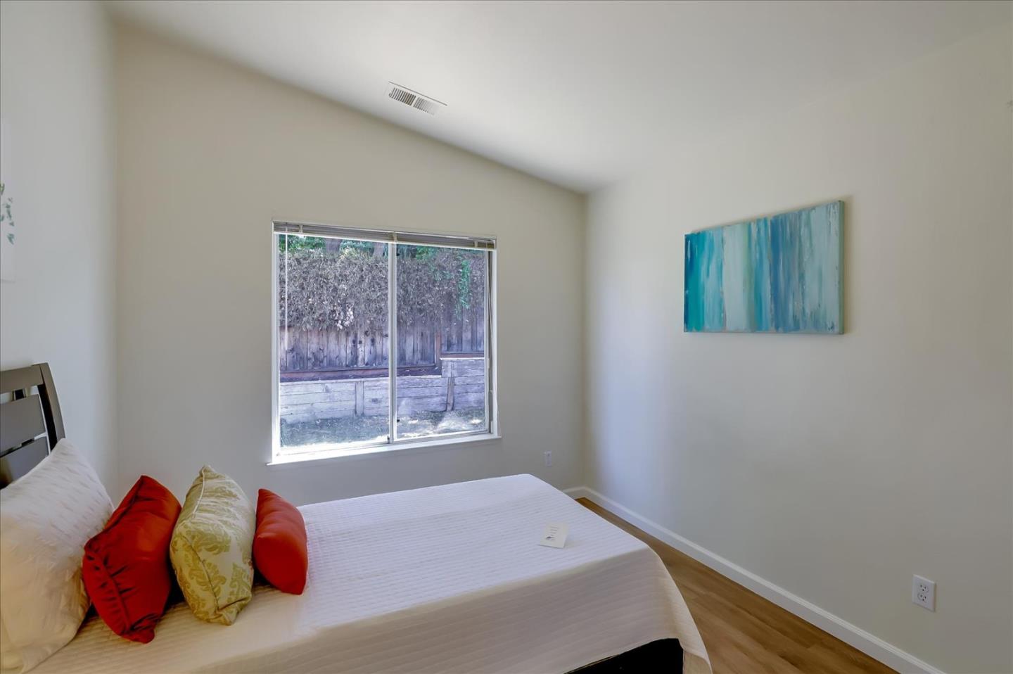 1274 Blacksmith Drive Gilroy, CA 95020 - Photo 15 of 30 a bedroom with a bed and a window