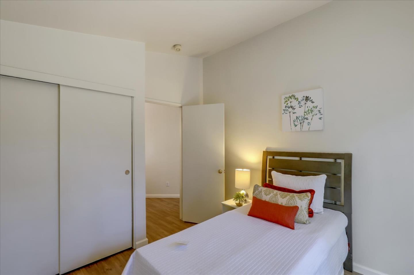 1274 Blacksmith Drive Gilroy, CA 95020 - Photo 16 of 30 a bedroom with a bed and a night stand