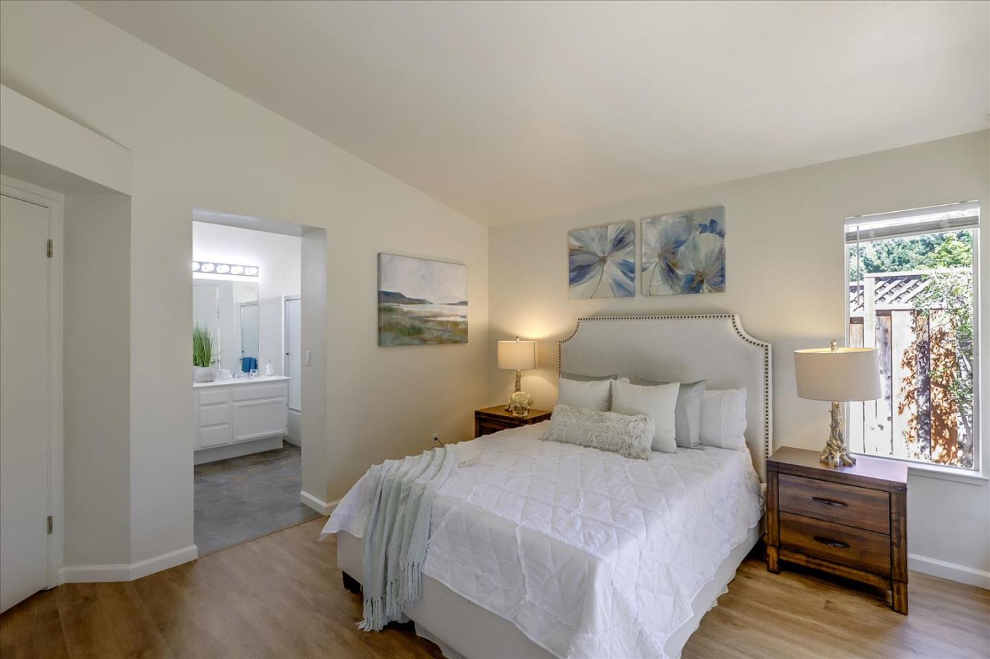 1274 Blacksmith Drive Gilroy, CA 95020 - Photo 18 of 30 a bedroom with a bed and a window