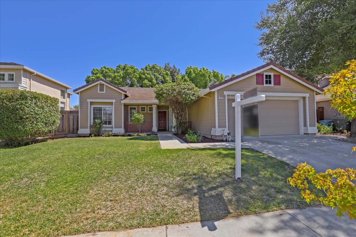 1274 Blacksmith Drive Gilroy, CA 95020 - Photo 2 of 30 a front view of a house with garden