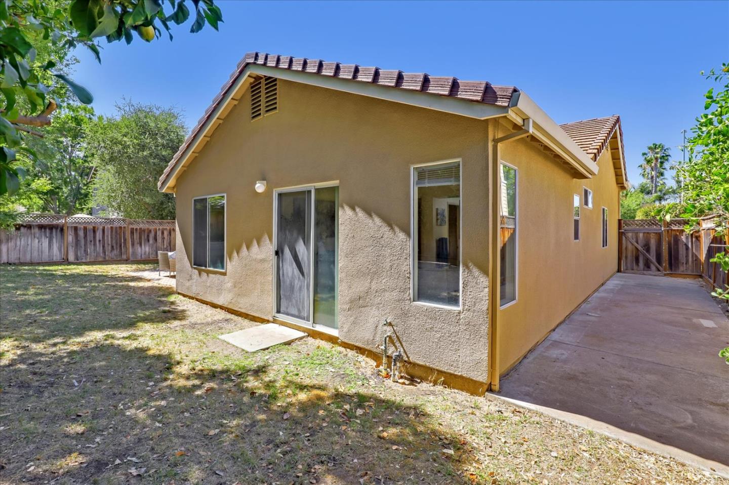1274 Blacksmith Drive Gilroy, CA 95020 - Photo 28 of 30 a view of a house with wooden fence