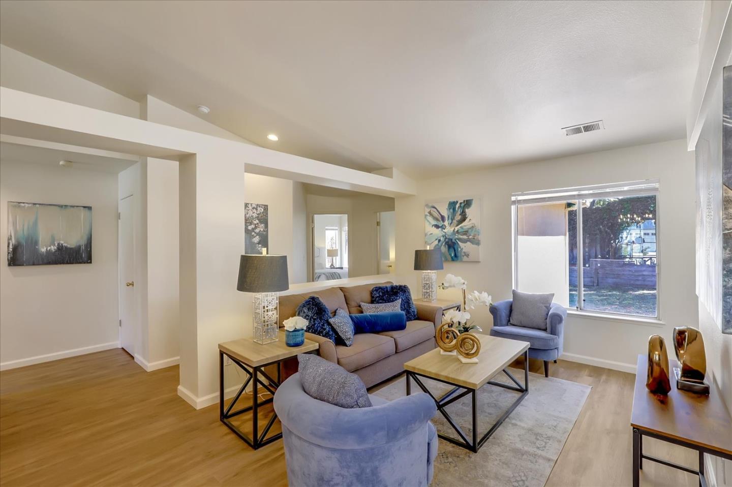 1274 Blacksmith Drive Gilroy, CA 95020 - Photo 7 of 30 a living room with furniture and wooden floor