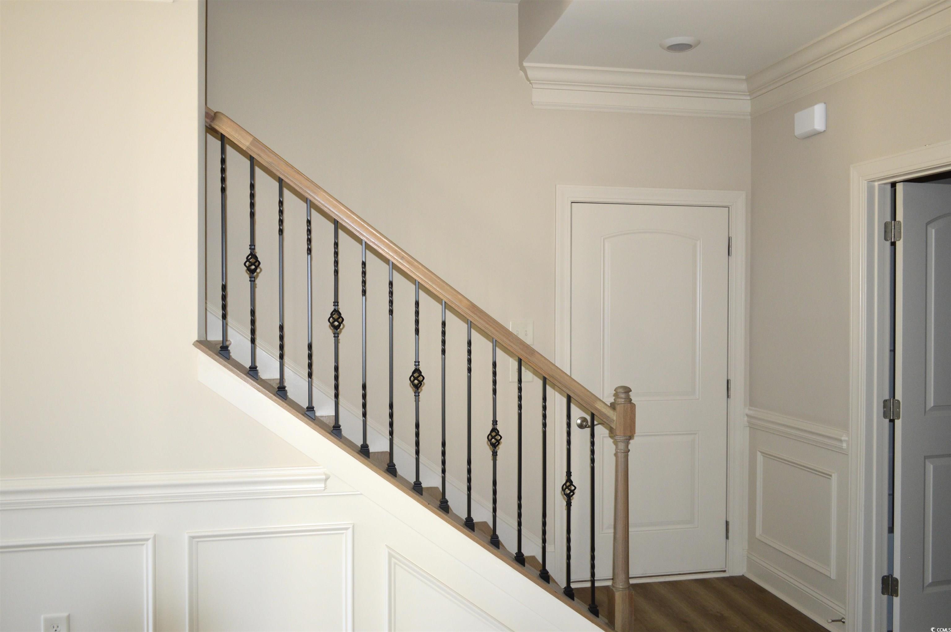 108 Hallandale Lane, Unit RIGHT Murrells Inlet, SC 29576 - Photo 18 of 35 Stairway featuring wood-type flooring and ornamental molding