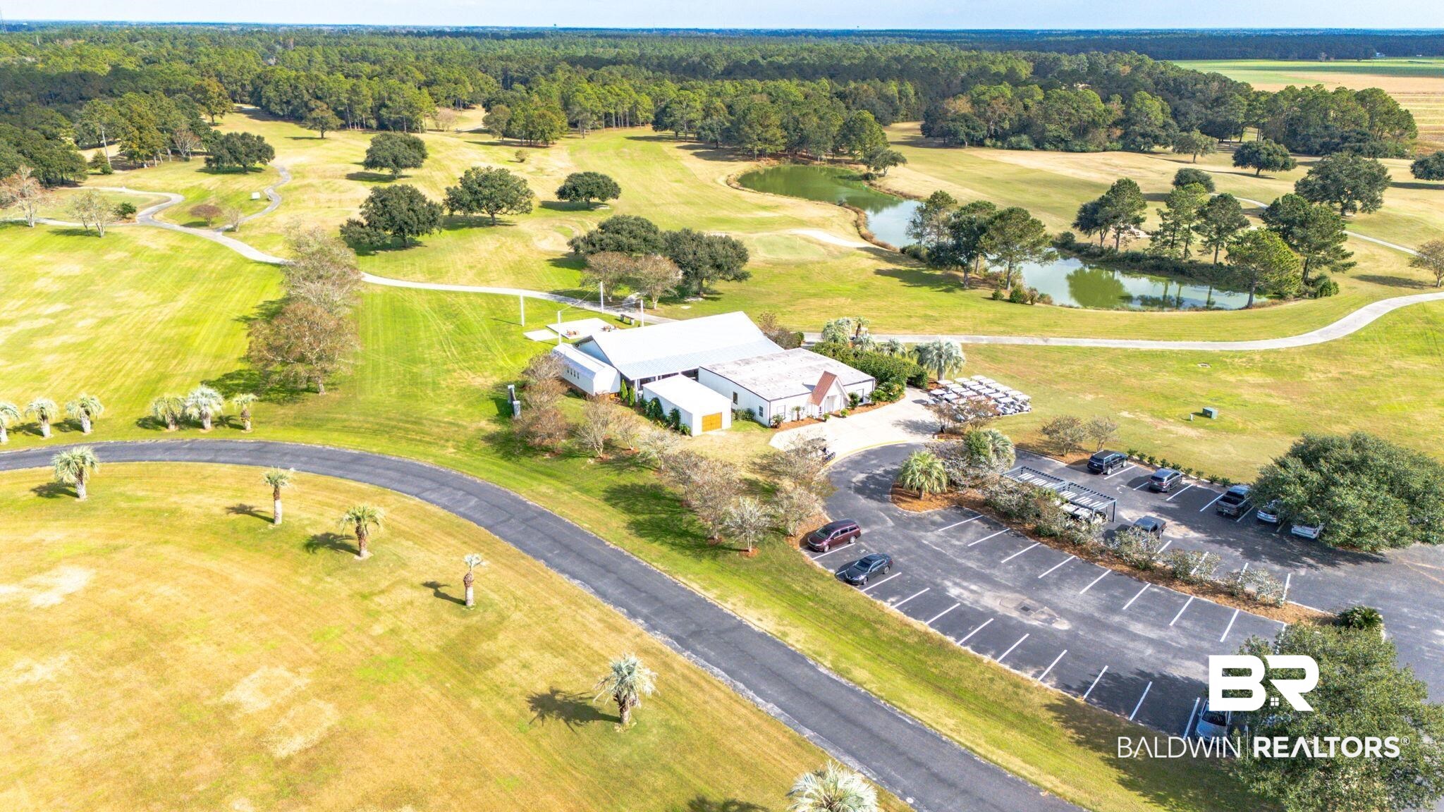 12004 Raptor Court Elberta, AL 36530 - Photo 48 of 57 Drone / aerial view of a nearby body of water and a golf club