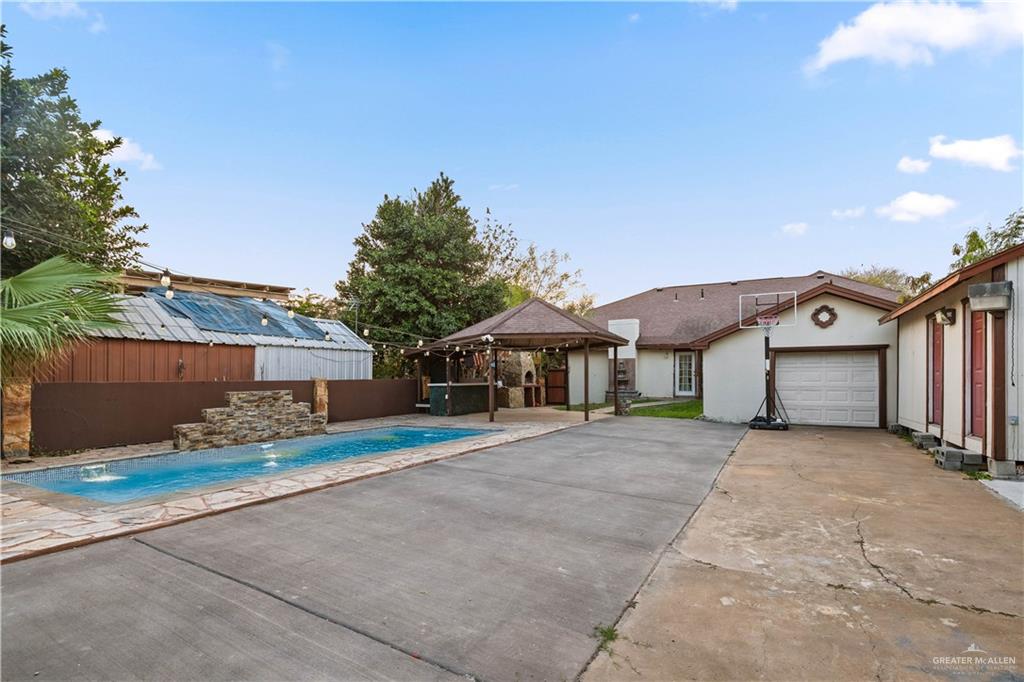 415 North 8th Street Hidalgo, TX 78557 - Photo 18 of 21 a front view of a house with a yard